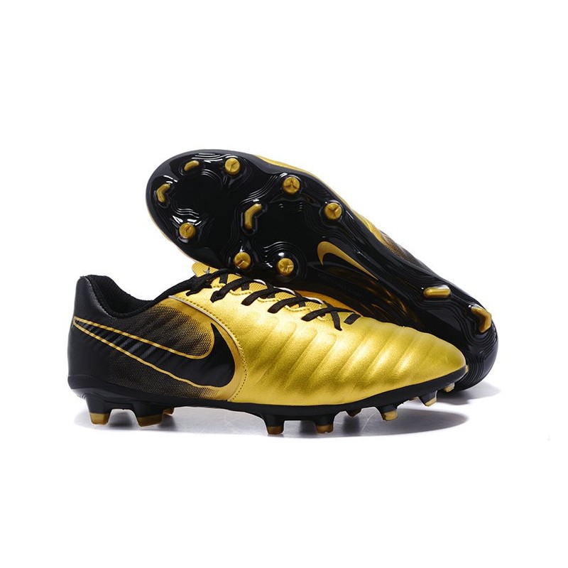gold and black nike football cleats